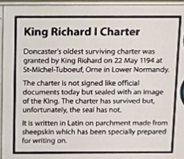 A close up of a sign

Description automatically generated